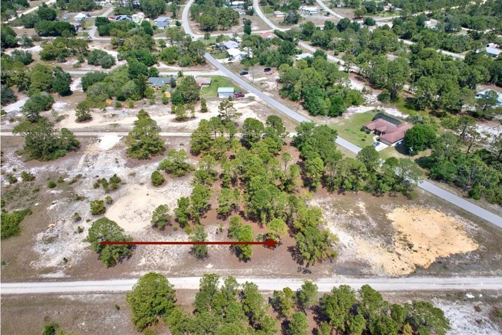 Arrow is approx location. Buyer recommended to have survey done for exact boundary lines