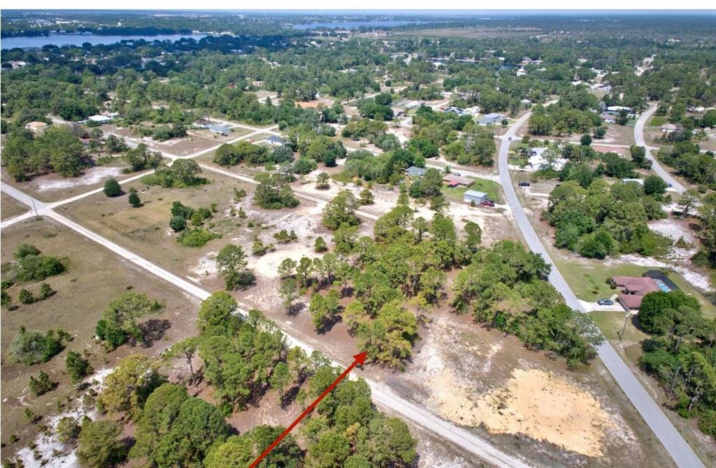 Arrow is approx location. Buyer recommended to have survey done for exact boundary lines