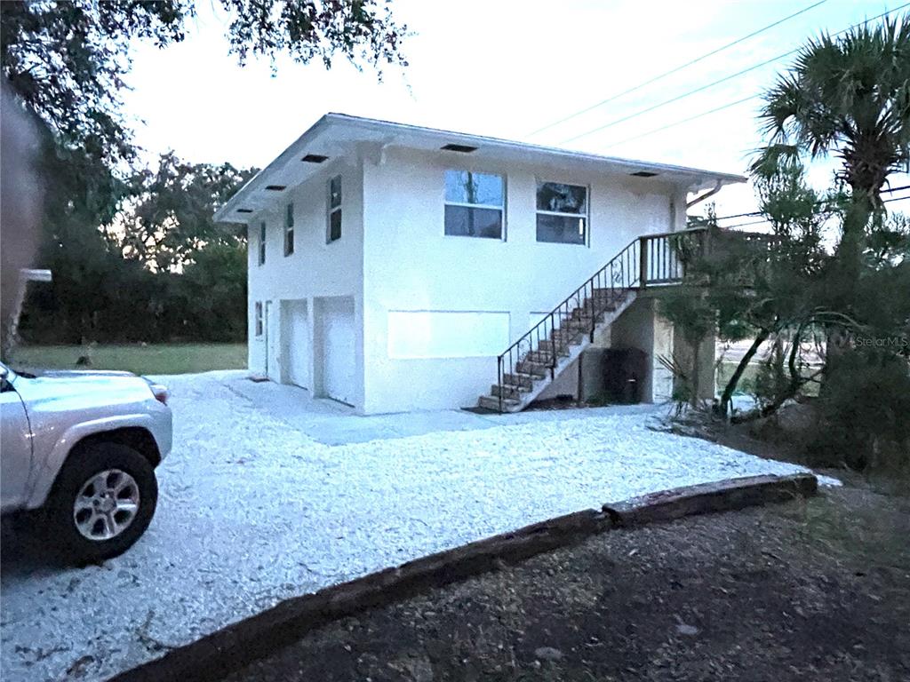 Parking area and house
