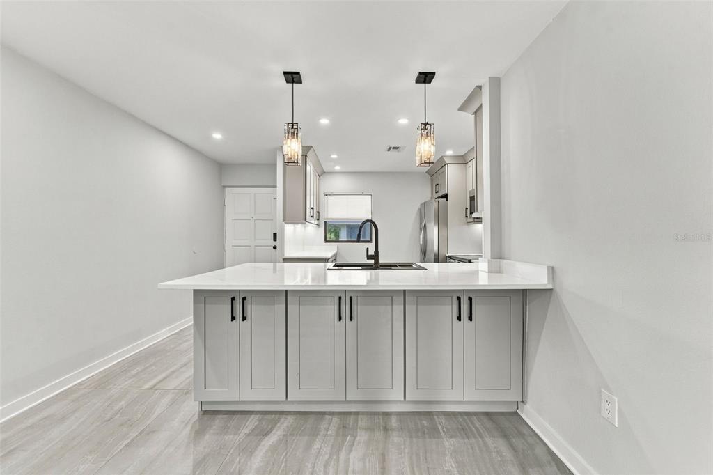 Bar seating in kitchen with additional under counter storage