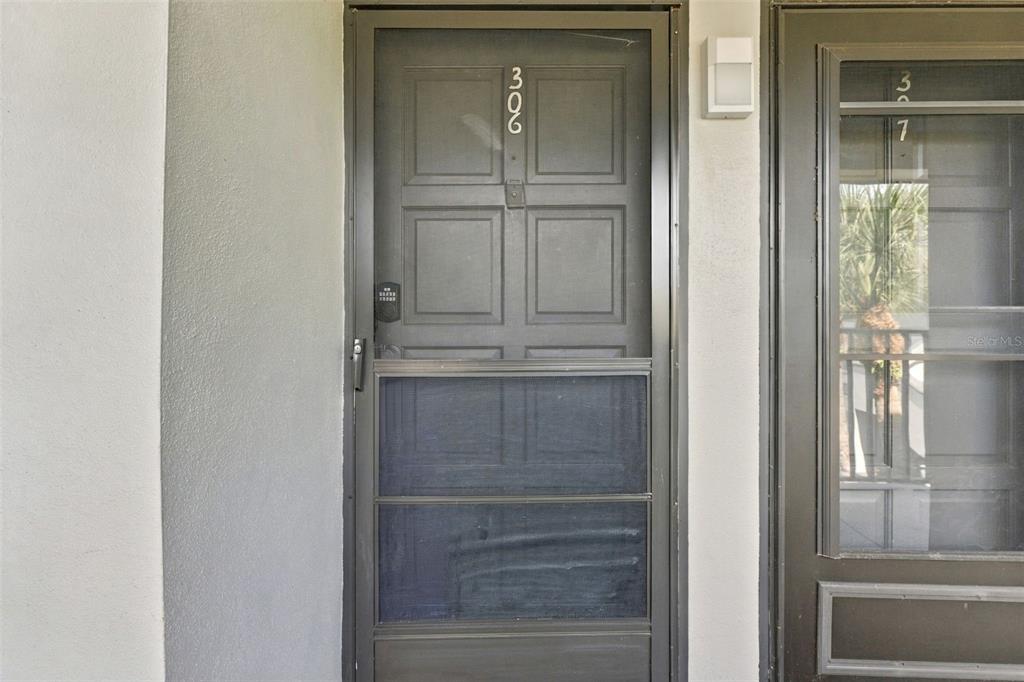 Front door to your unit just steps from the elevator on the 3rd floor
