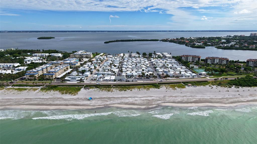 Front row with Gulf across street/deeded beach access