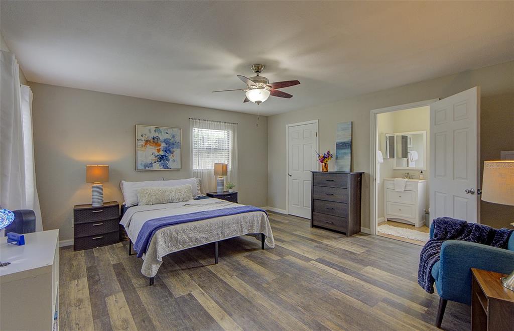 Primary Suite #2 sits separately from rest of the bedrooms and off the kitchen and living room, perfect for renting or multigenerational living.