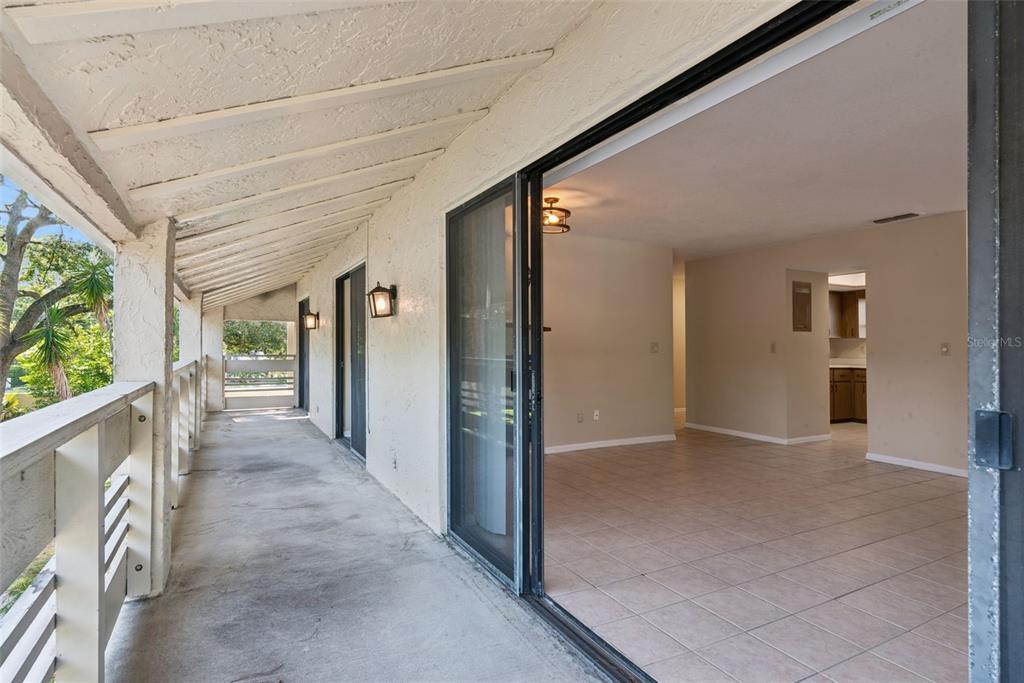 Expansive covered patio with access from 3 rooms