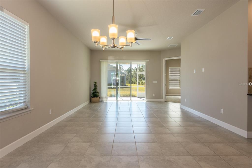 Open concept -- view from dining area looking towards living area and lanai