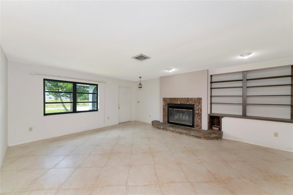 Living Room with Wood Burning Fireplace