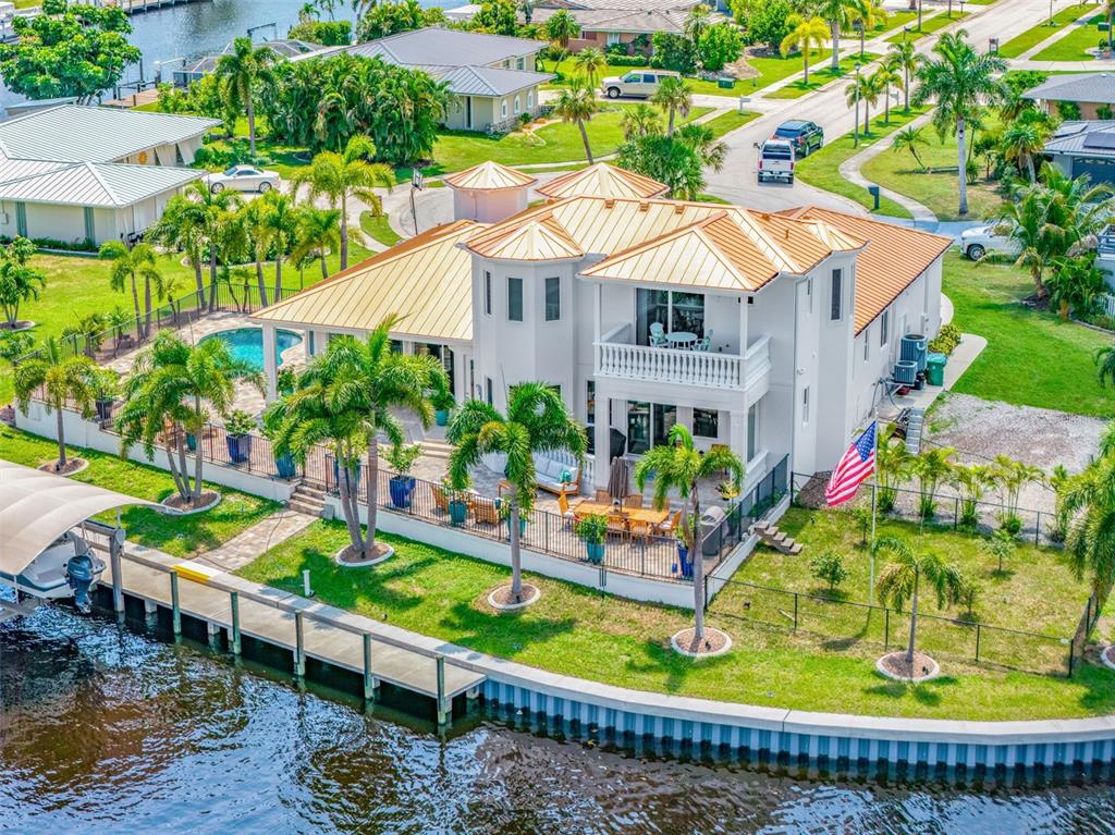 Stunning Aerial Highlighting Pool, Outdoor Living Areas and Waterfront Access
