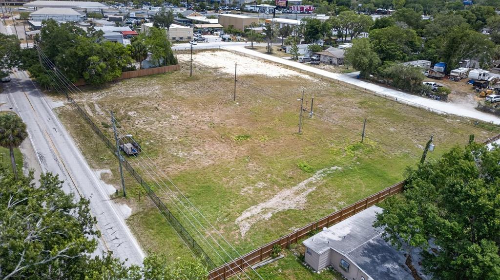 Sold together-9 parcels inside black chain link fence