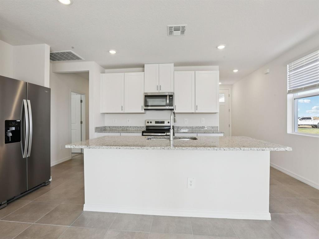 Photo is not of the actual home, but is an inspirational photo of builder’s model home and may depict options, furnishings, and/or decorator features that are not included