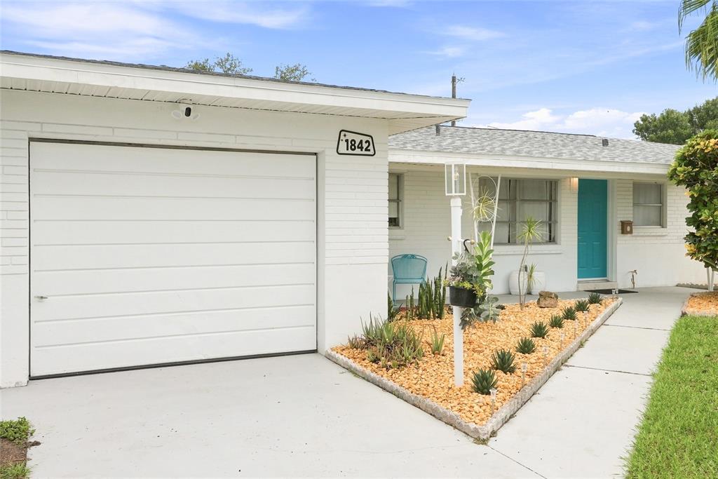 Welcome to an original mid-century home with modern upgrades at 1842 59th Way N!