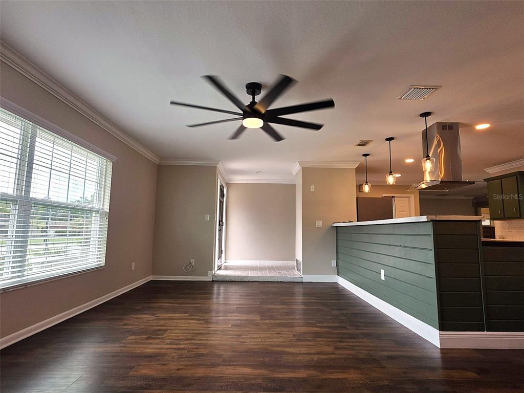 LIVING ROOM TO FOYER