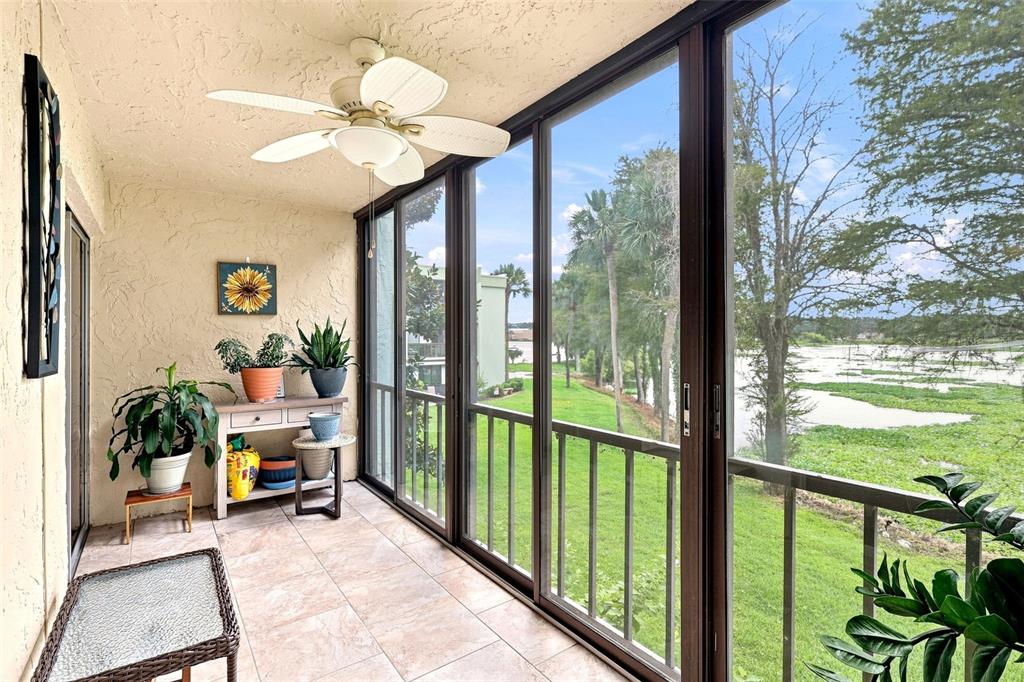 Screened lanai looking out at Lake Parker