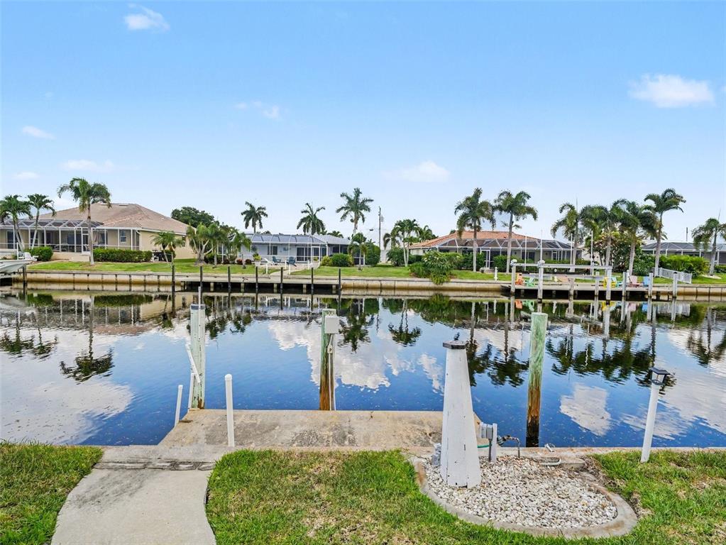 Wide canal views with dock and space for your boat! 6-8 minutes to open water, your boating lifestyle starts immediately!