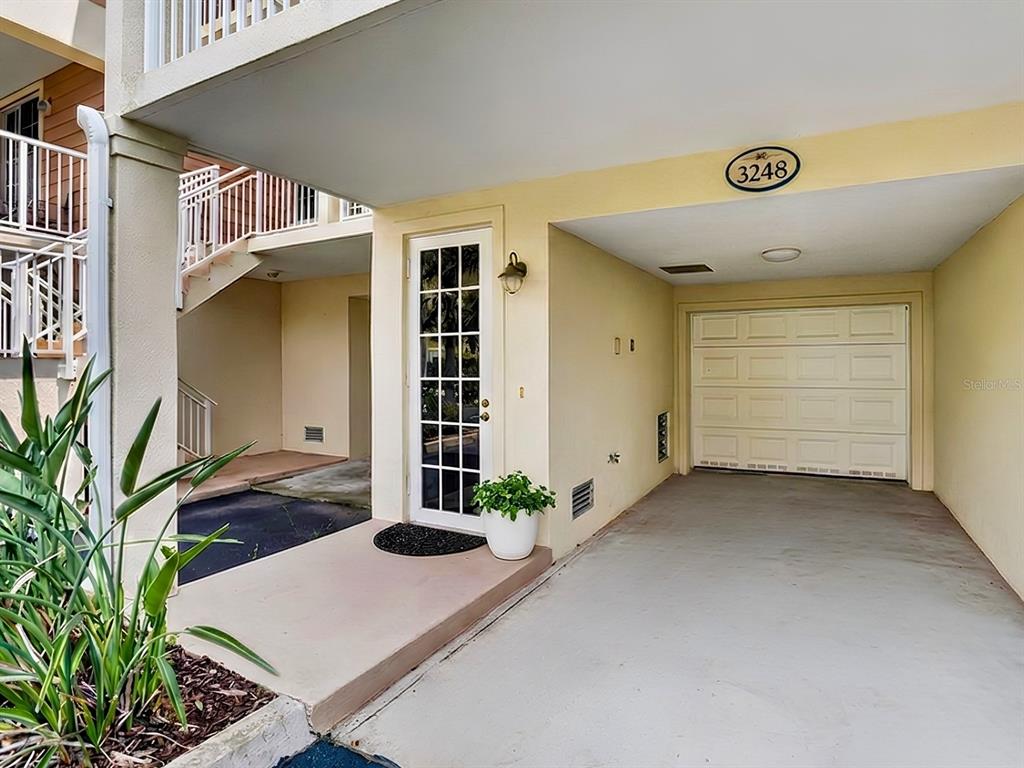 One-car garage with driveway parking