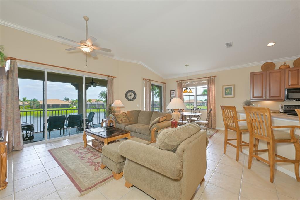 Open great room/kitchen.  Barely used furnishings.