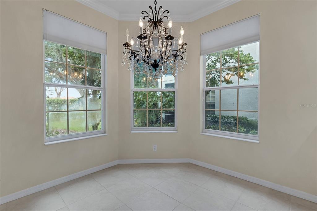 Tall windows allow beautiful filtered light to flood the entire space.