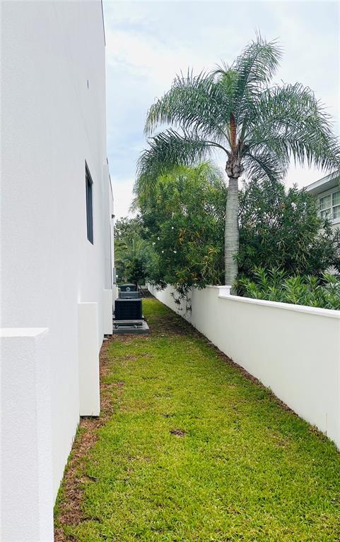 SOUTH SIDE WITH SURROUNDING WALL